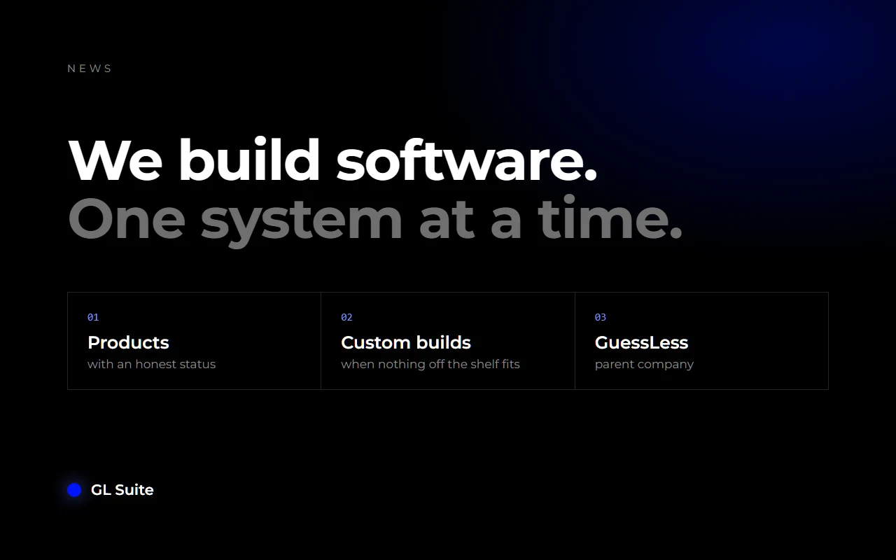 The line "We build software. One system at a time." on a black background, with GL Suite's three pillars: products, custom builds and GuessLess.